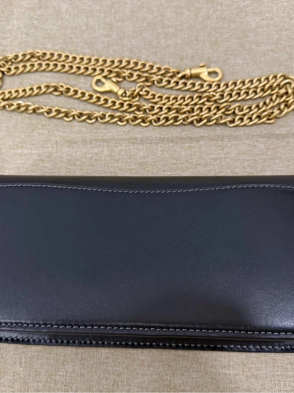 Coach sleek black